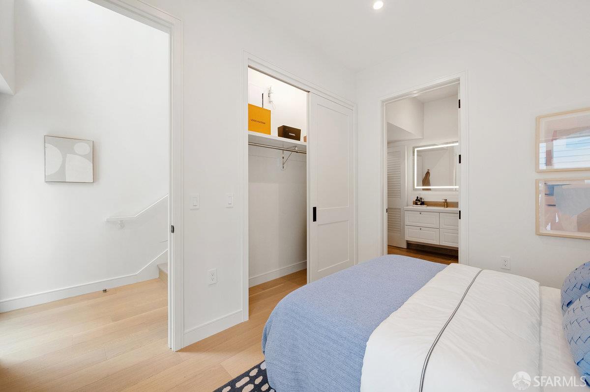 150 Eureka Street, Unit A San Francisco, CA 94114 - Photo 29 of 60 a bedroom with a bed and a cabinets