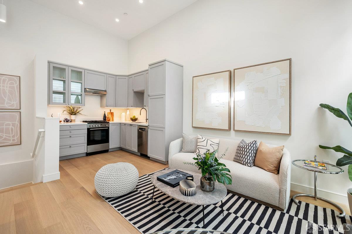 150 Eureka Street, Unit A San Francisco, CA 94114 - Photo 3 of 60 a living room with furniture and kitchen view