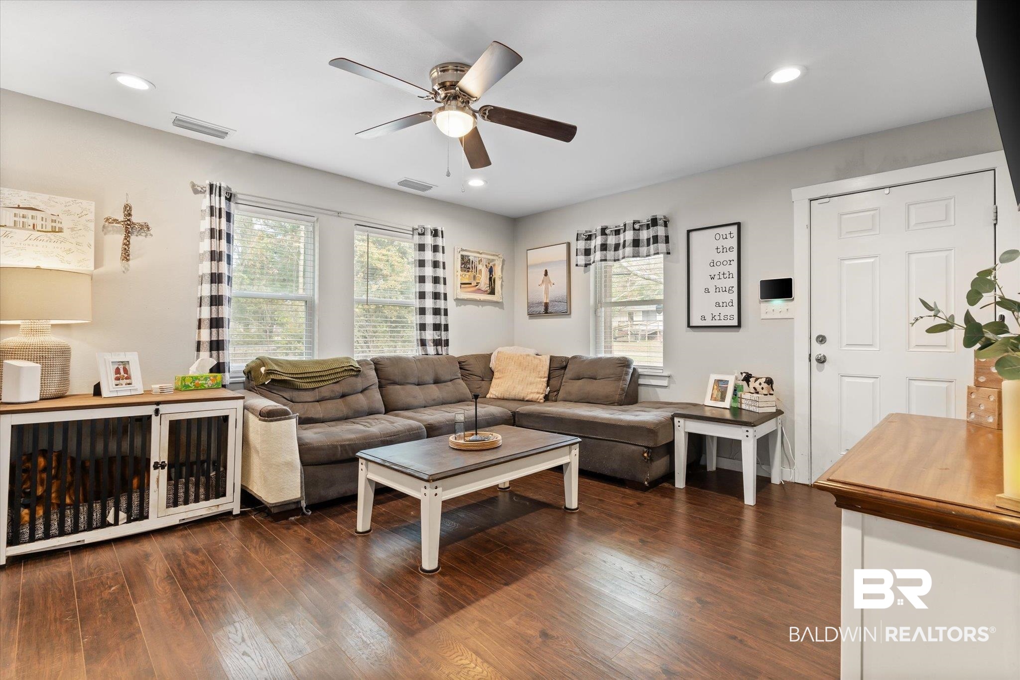419 Pierce Street Saraland, AL 36571 - Photo 4 of 21 Living room featuring dark hardwood / wood-style floors, beverage cooler, and ceiling fan