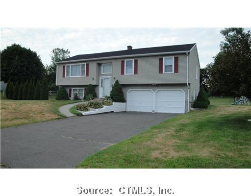 a black and white photo of a house
