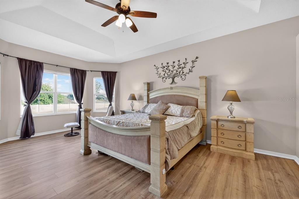 17312 Howling Wolf Run Parrish, FL 34219 - Photo 19 of 41 a bed room with a bed and a window