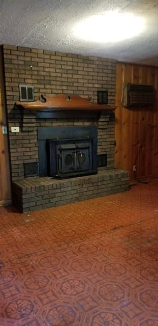 6775 Fall River Road Leoma, TN 38468 - Photo 4 of 26 a view of an empty room with wooden floor