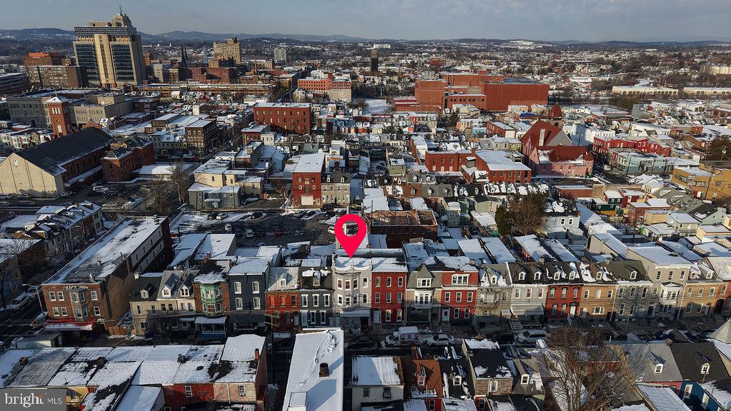 Charming cityscape blanketed in snow.