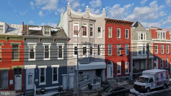 a front view of a building with glass windows