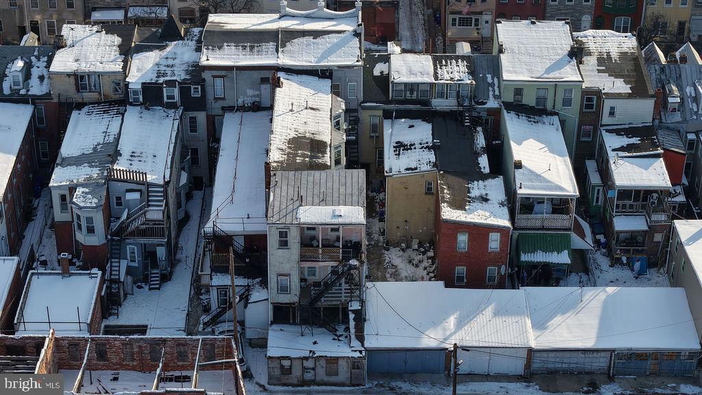 226 North 10th Street Reading, PA 19601 - Photo 14 of 56 Snow-covered rooftops in a cozy neighborhood.