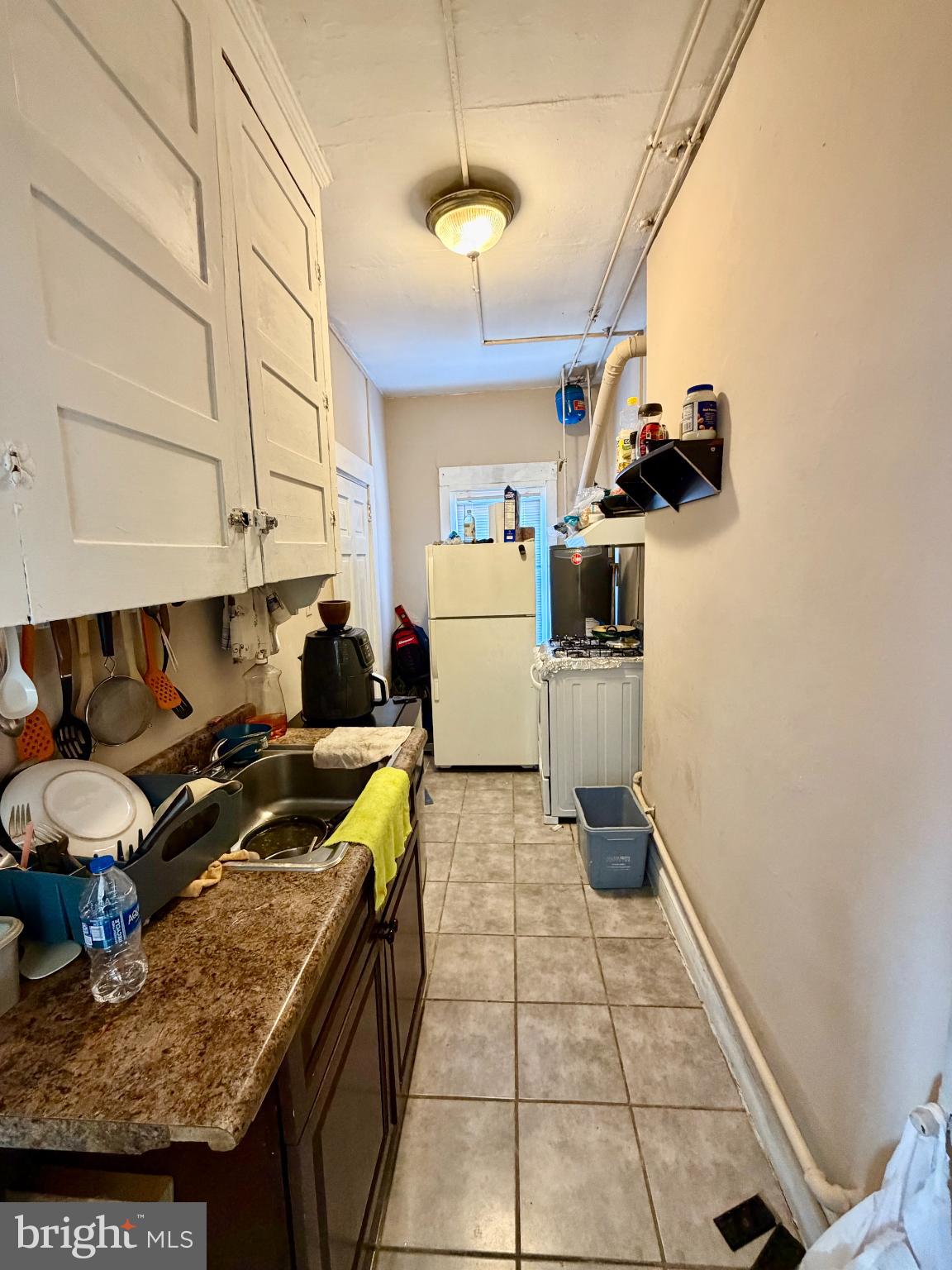 226 North 10th Street Reading, PA 19601 - Photo 34 of 56 Cozy kitchen with vintage charm and utility.
