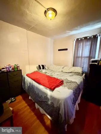 a bathroom with a sink toilet and mirror