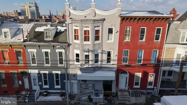 a front view of multi story residential apartment building