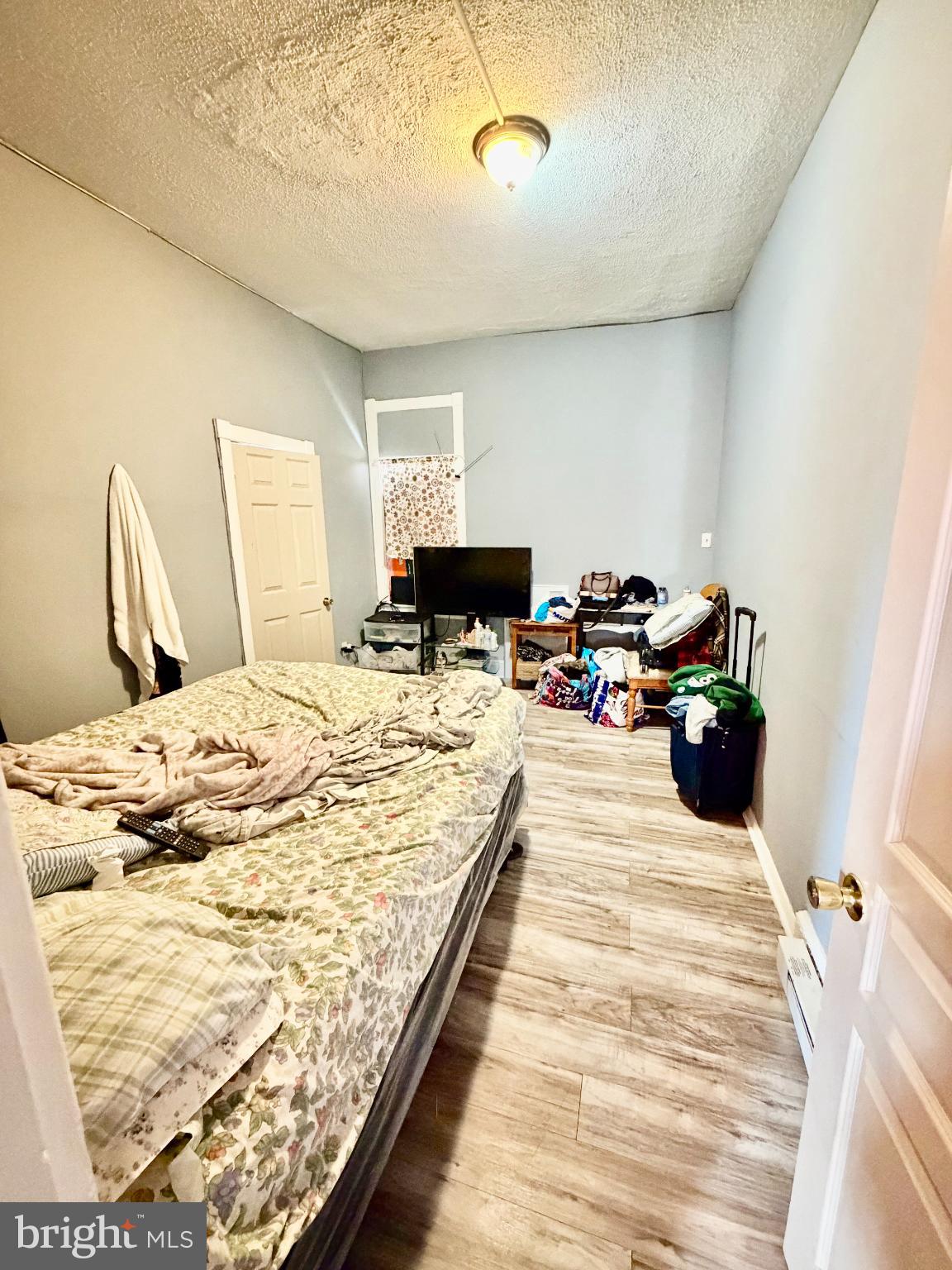 226 North 10th Street Reading, PA 19601 - Photo 51 of 56 Cozy bedroom with inviting natural light.