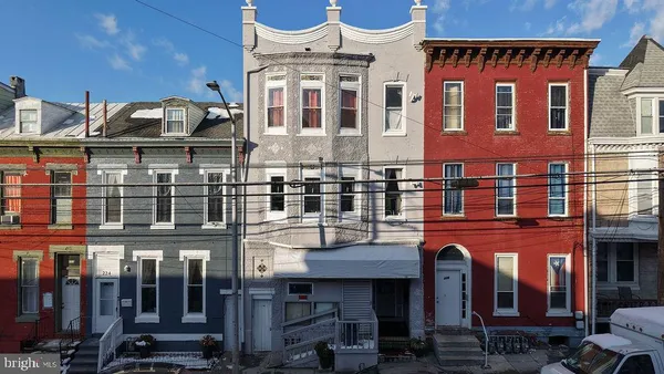 a front view of a building with glass windows