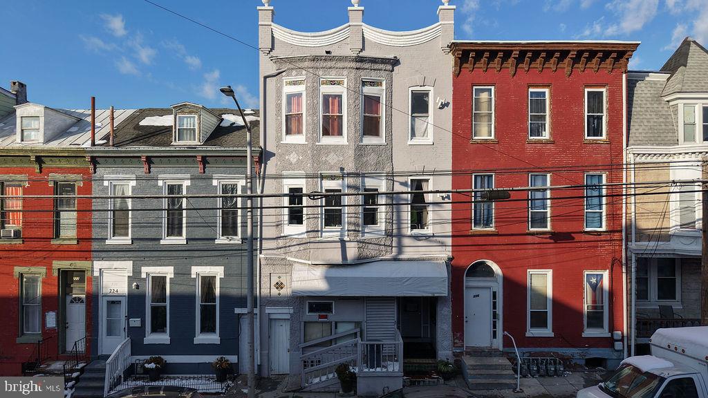 226 North 10th Street Reading, PA 19601 - Photo 7 of 56 Charming row homes with vibrant facades.