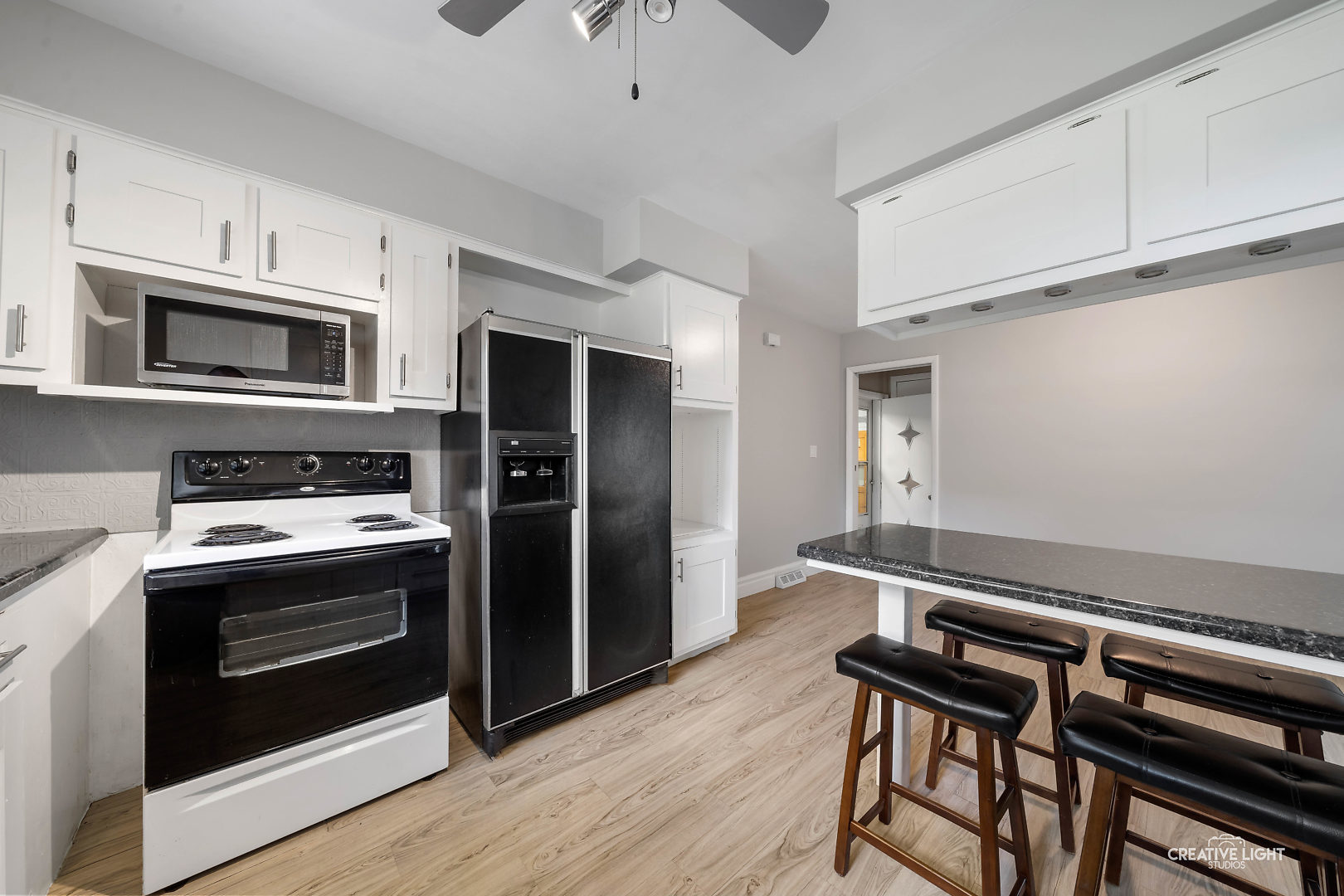 1255 North Randall Road Aurora, IL 60506 - Photo 16 of 39 a kitchen with stainless steel appliances a stove microwave and a refrigerator