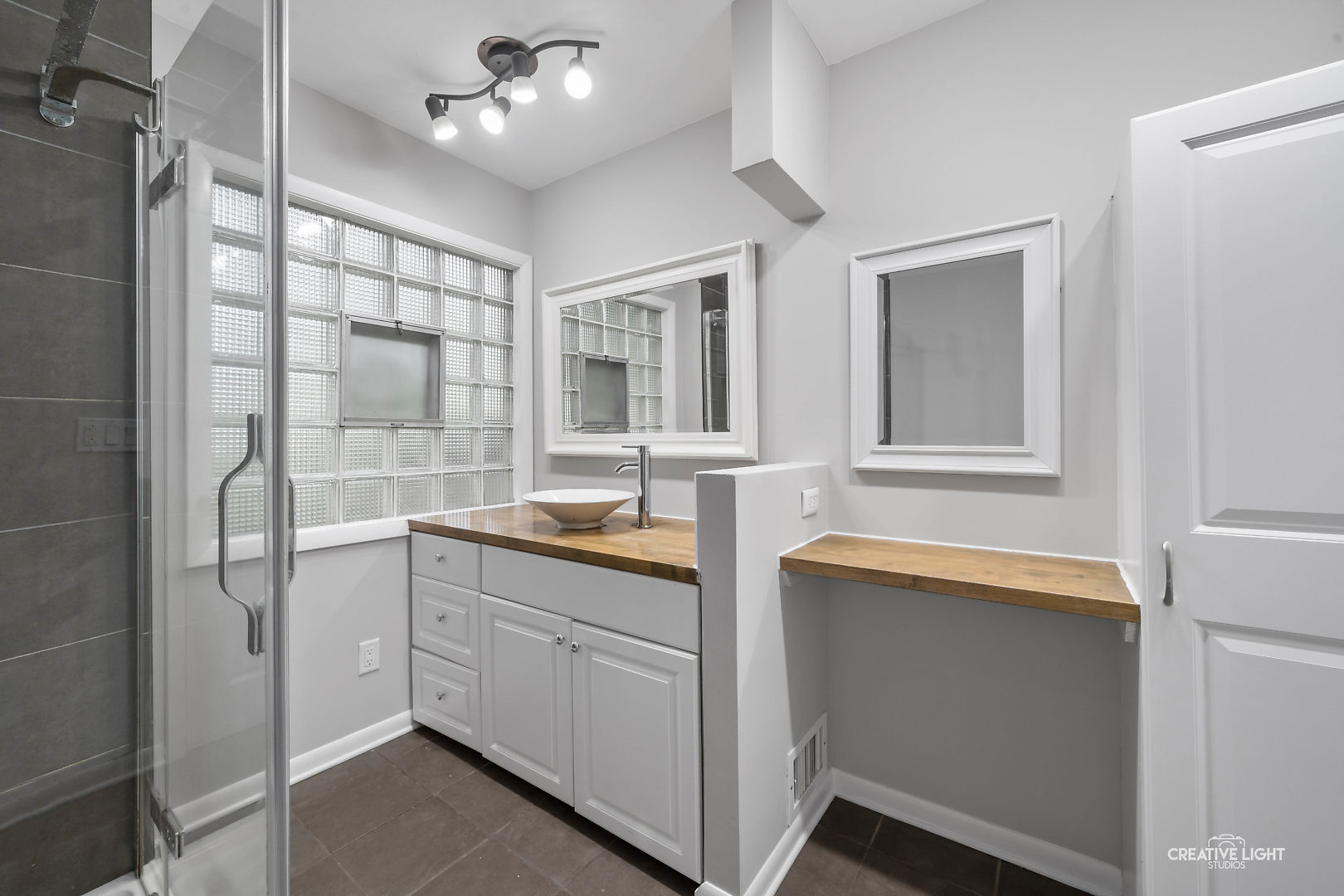 1255 North Randall Road Aurora, IL 60506 - Photo 20 of 39 a kitchen with a sink and chandelier