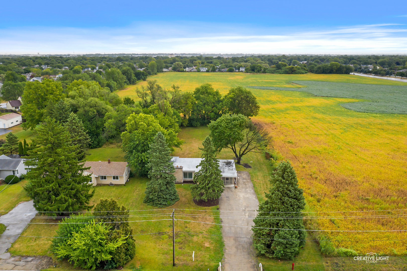 1255 North Randall Road Aurora, IL 60506 - Photo 3 of 39 an aerial view of ocean boats and trees