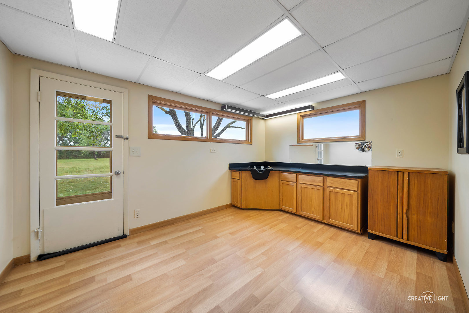 1255 North Randall Road Aurora, IL 60506 - Photo 25 of 39 a view of an empty room with window and wooden floor