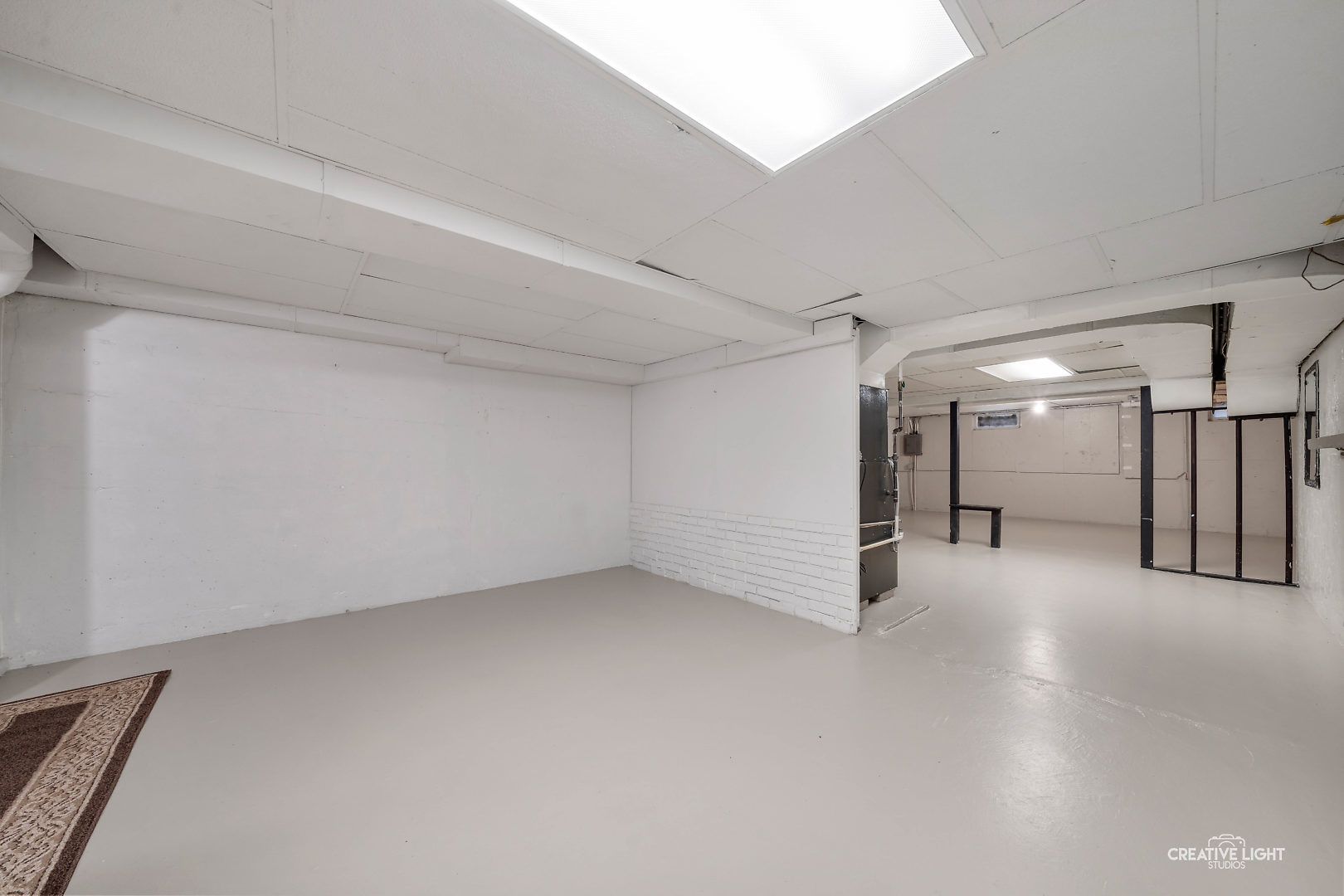 1255 North Randall Road Aurora, IL 60506 - Photo 29 of 39 a view of a hall with an empty room