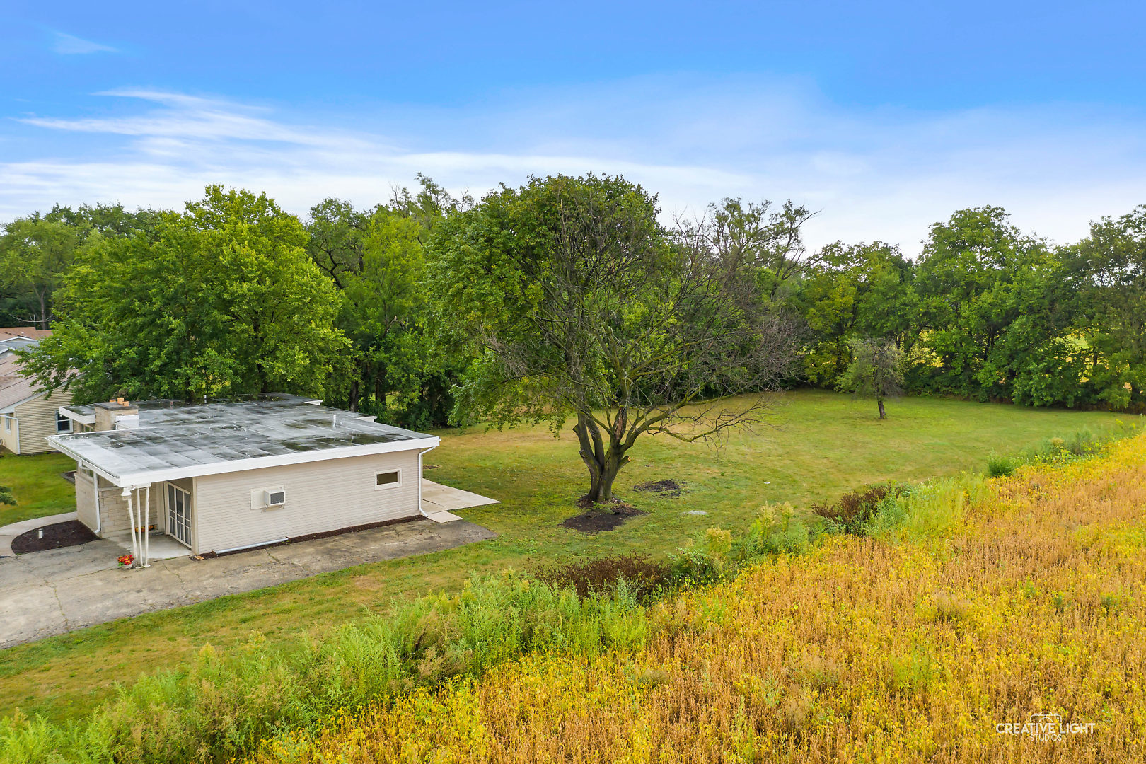 1255 North Randall Road Aurora, IL 60506 - Photo 39 of 39 a view of a swimming pool with an outdoor space and seating area