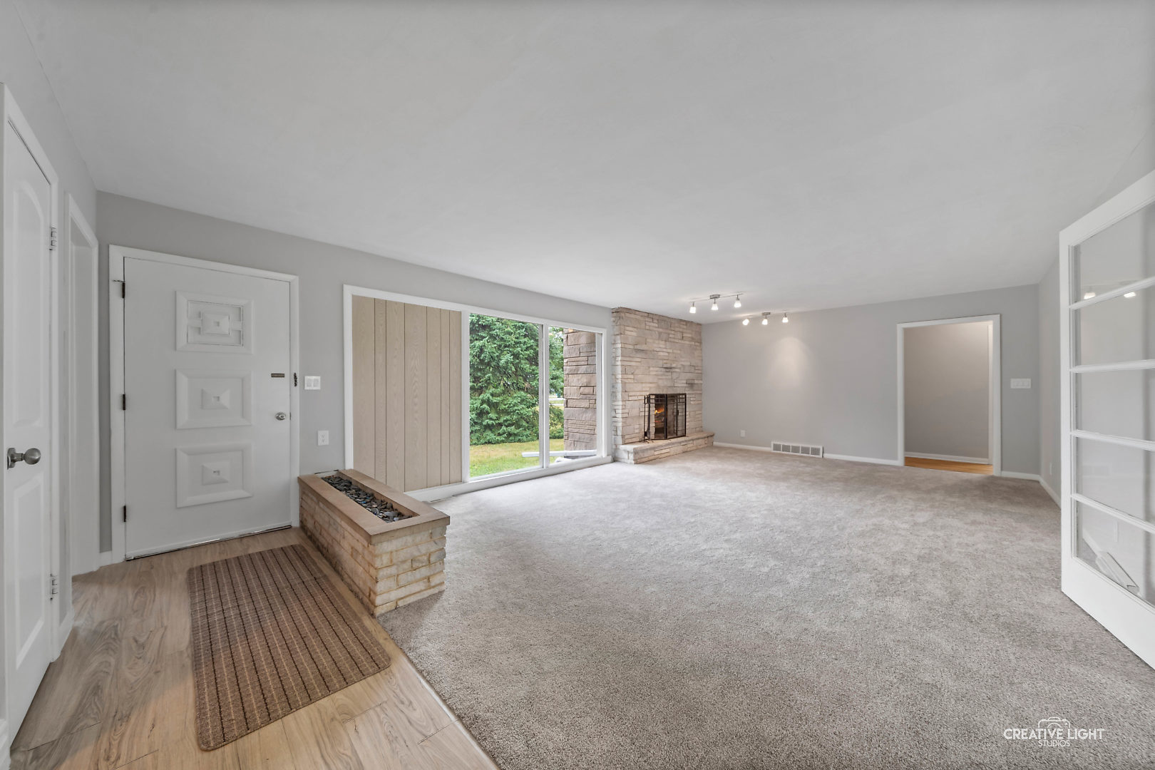1255 North Randall Road Aurora, IL 60506 - Photo 7 of 39 a view of a livingroom with furniture and wooden floor