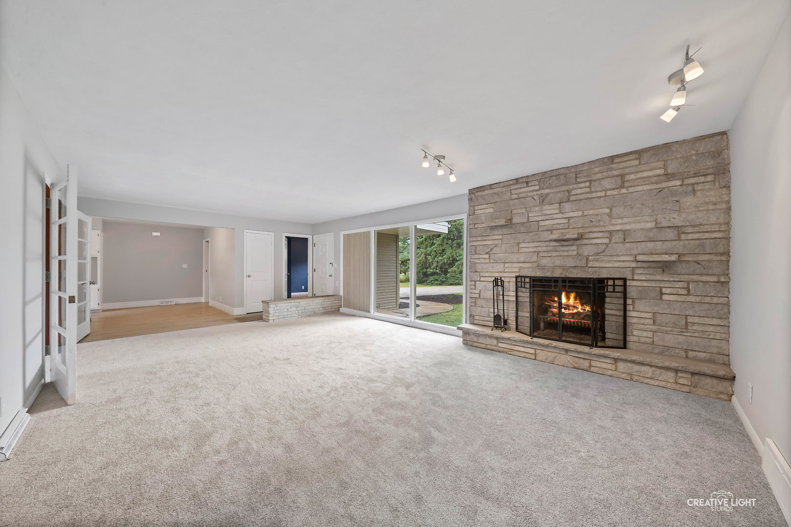 1255 North Randall Road Aurora, IL 60506 - Photo 8 of 39 a view of empty room with a fireplace
