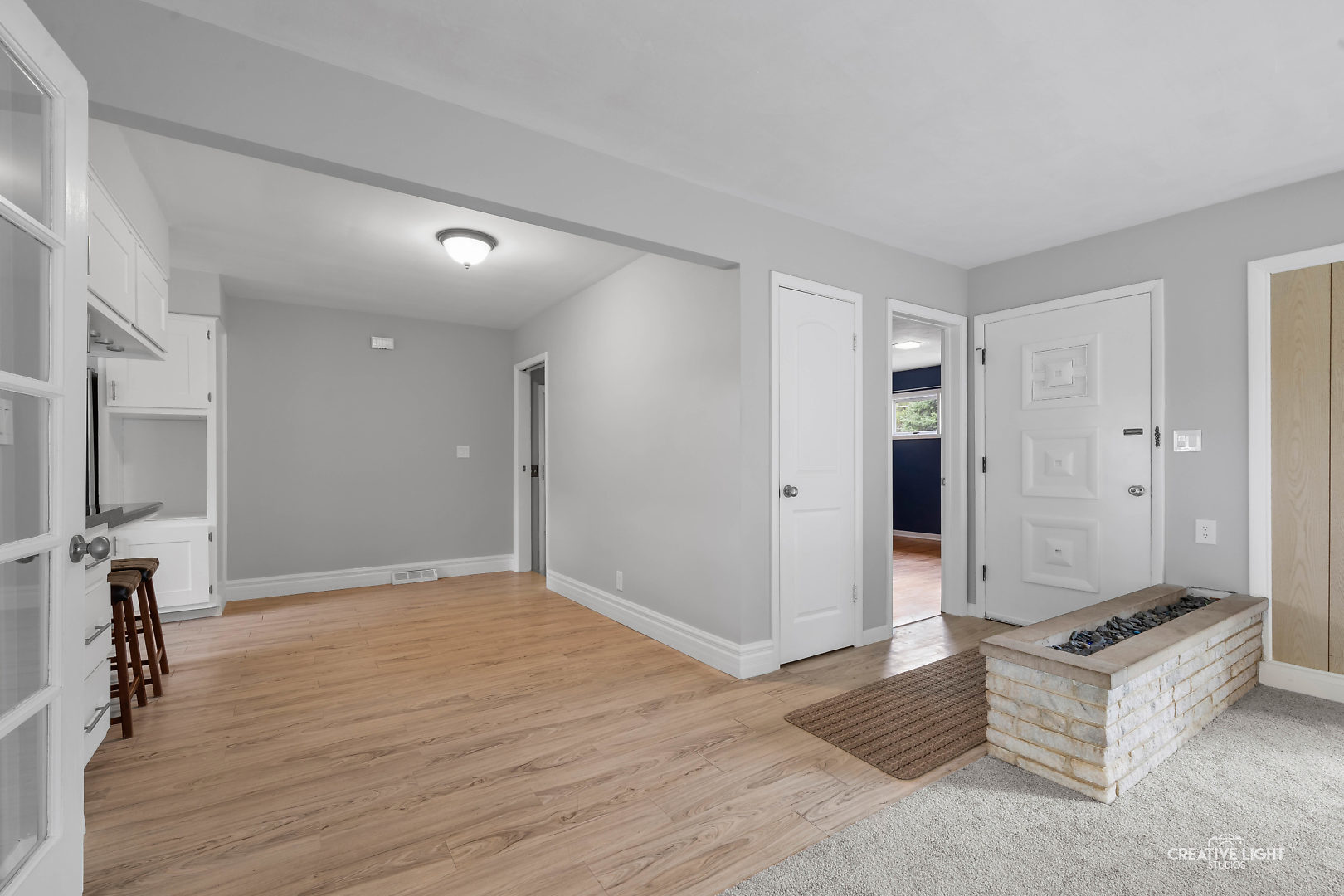 1255 North Randall Road Aurora, IL 60506 - Photo 10 of 39 a view of livingroom with hardwood floor and a ceiling fan