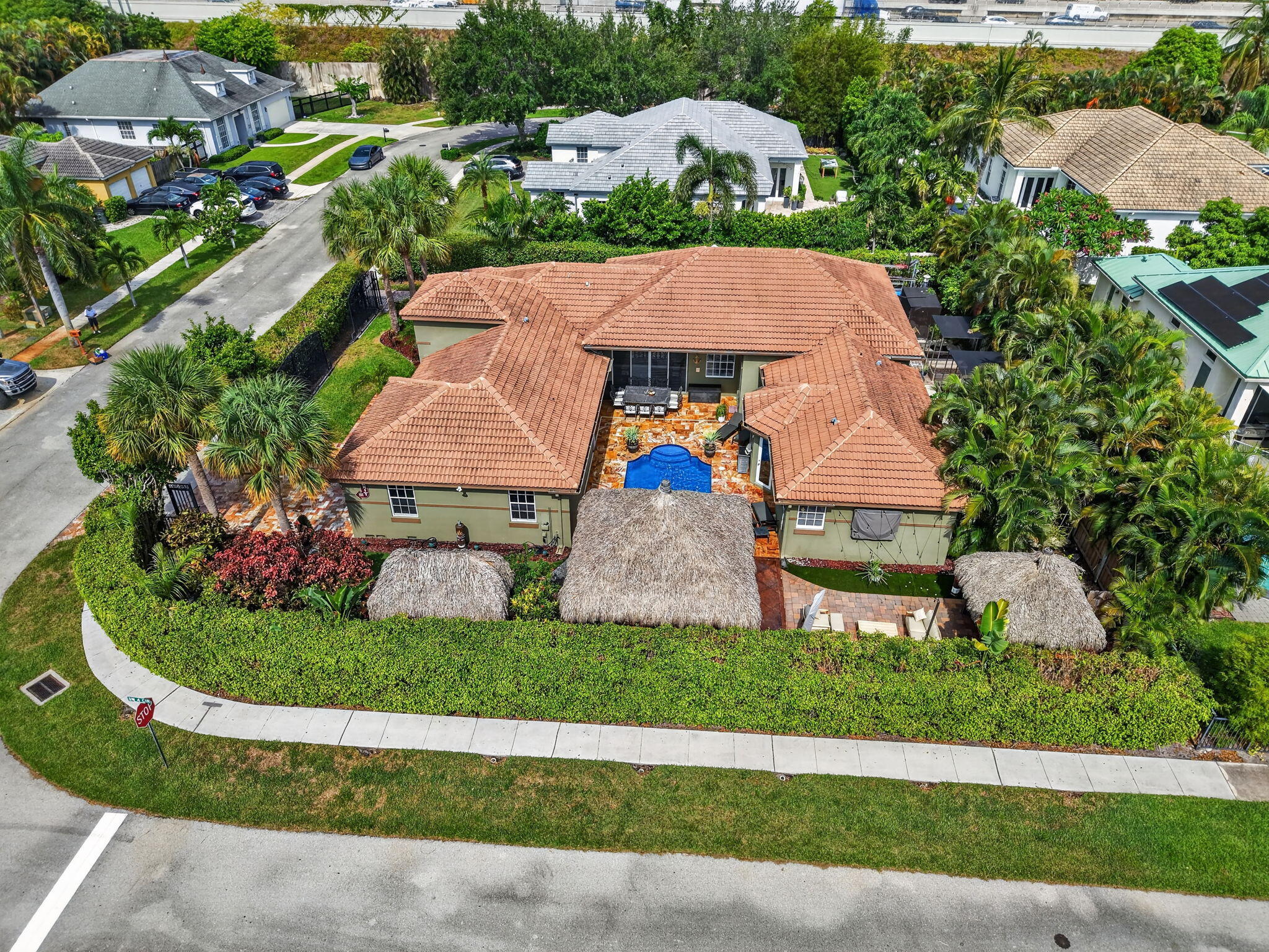 1590 Southwest 4th Circle Boca Raton, FL 33486 - Photo 1 of 77 65-web-or-mls-DJI_20260727103841_0021_D