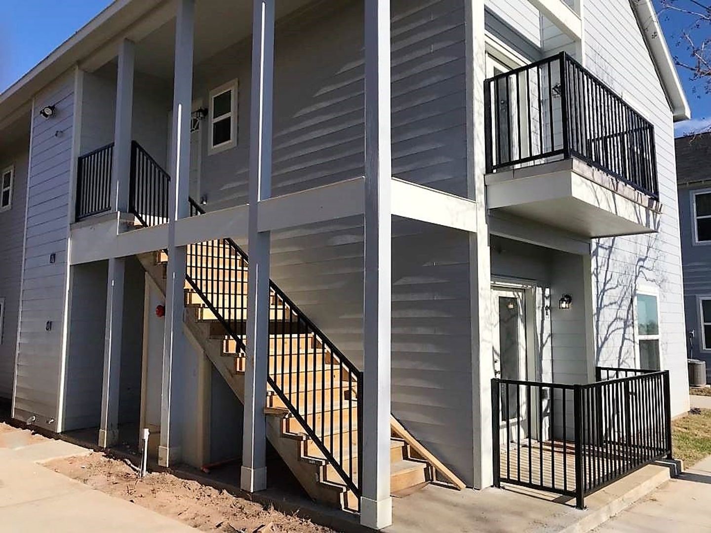 430 Schmidt Road, Unit A2 Sealy, TX 77474 - Photo 1 of 16 a view of a house with balcony