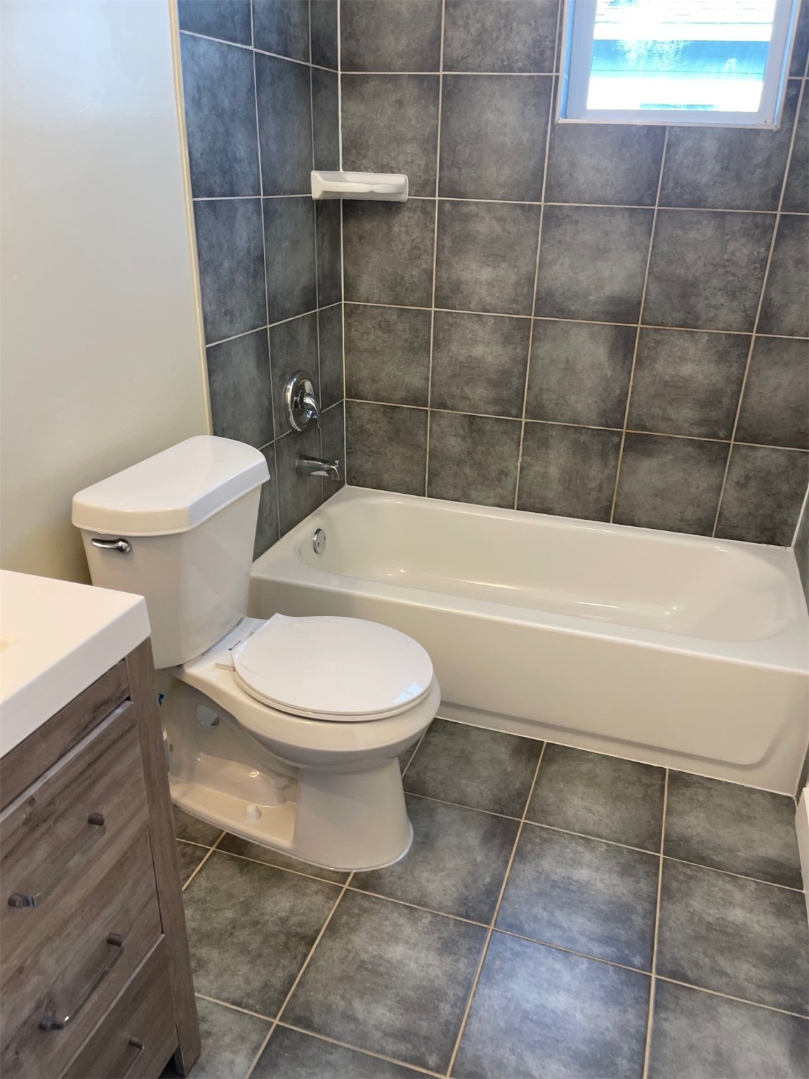 430 Schmidt Road, Unit A2 Sealy, TX 77474 - Photo 12 of 16 a bathroom with a toilet a sink and shower