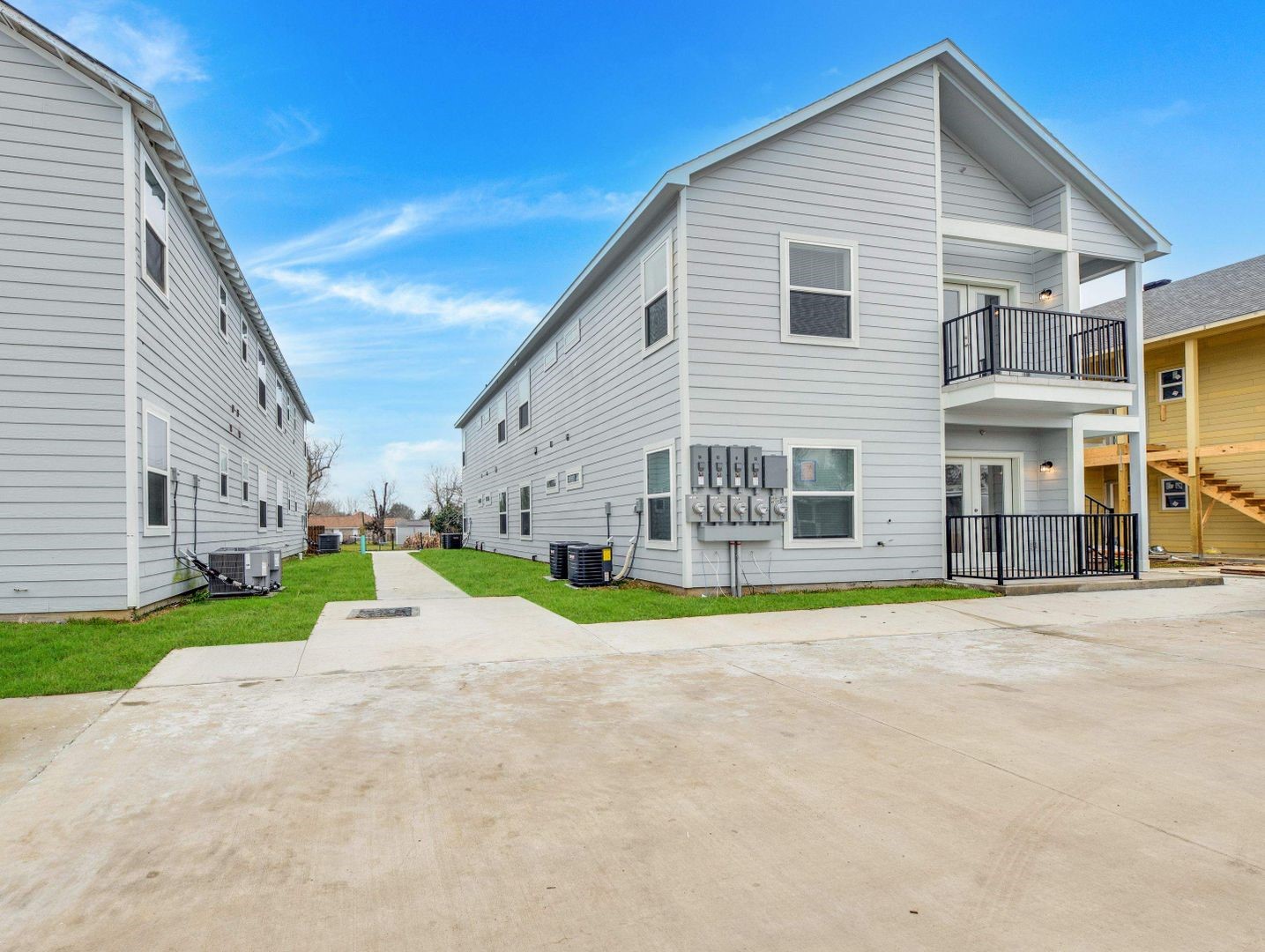 430 Schmidt Road, Unit A2 Sealy, TX 77474 - Photo 2 of 16 a view of a house with a yard and plants