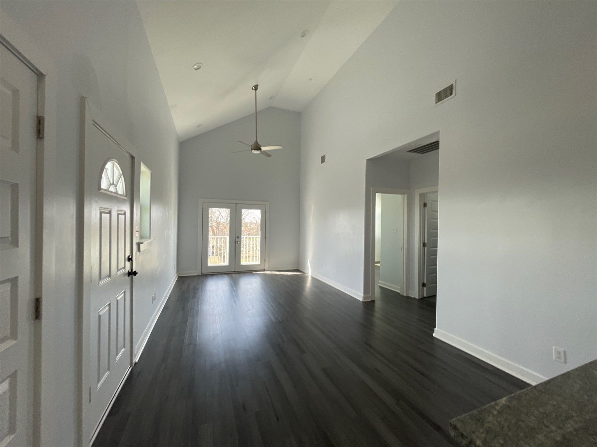 430 Schmidt Road, Unit A2 Sealy, TX 77474 - Photo 6 of 16 a view of a hallway with wooden floor