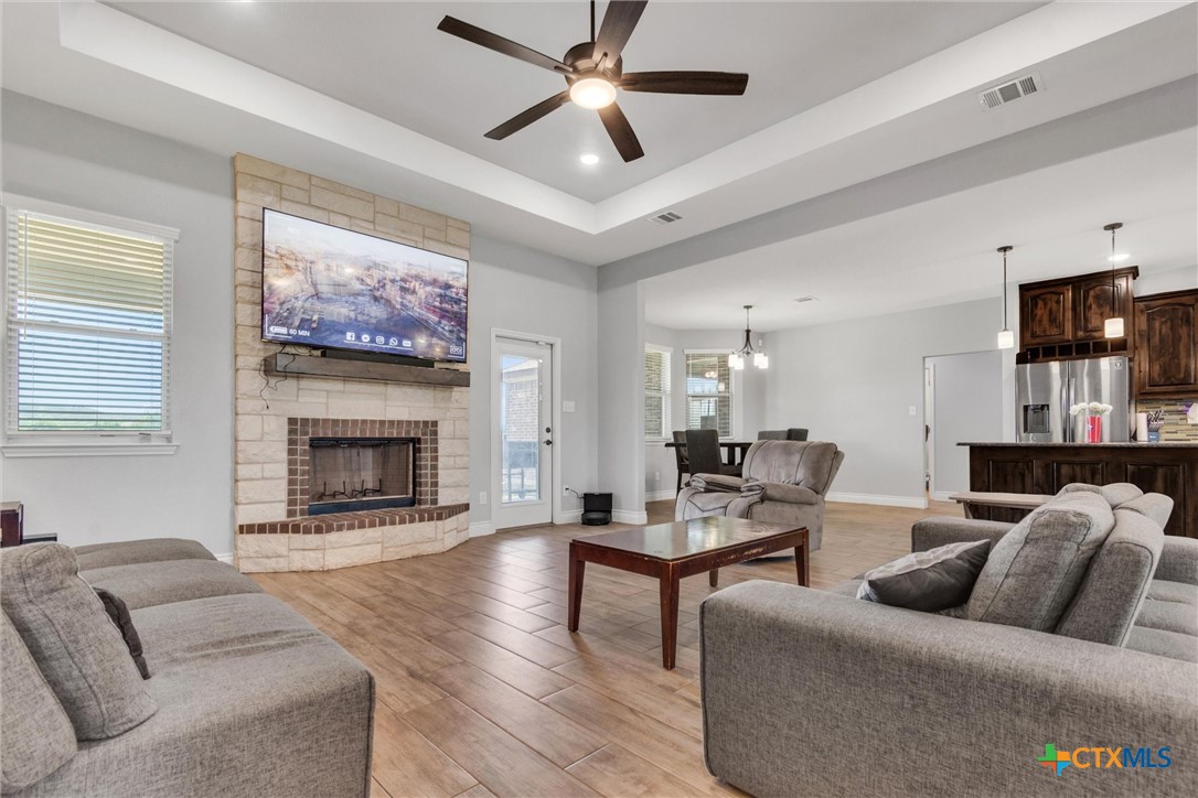 3919 Gracey Lane Kempner, TX 76539 - Photo 14 of 44 a living room with furniture and a fireplace