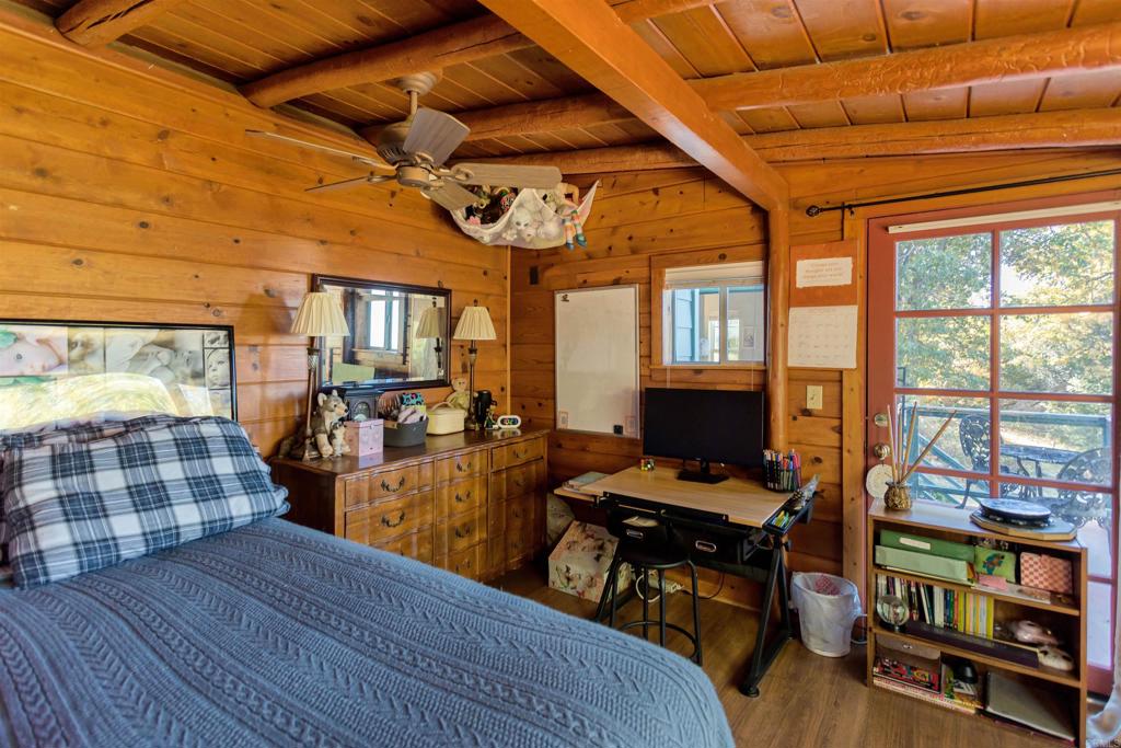 32787 Birch Hill Road Palomar Mountain, CA 92060 - Photo 26 of 44 a bedroom with furniture and large window