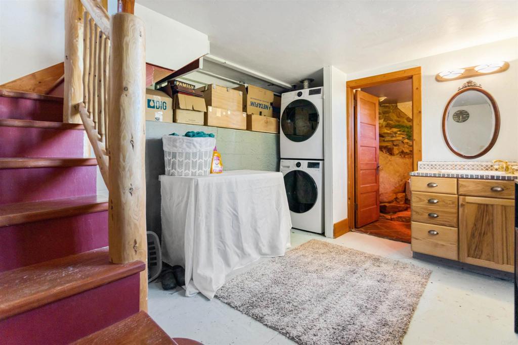32787 Birch Hill Road Palomar Mountain, CA 92060 - Photo 27 of 44 a bedroom with a bed and cabinets