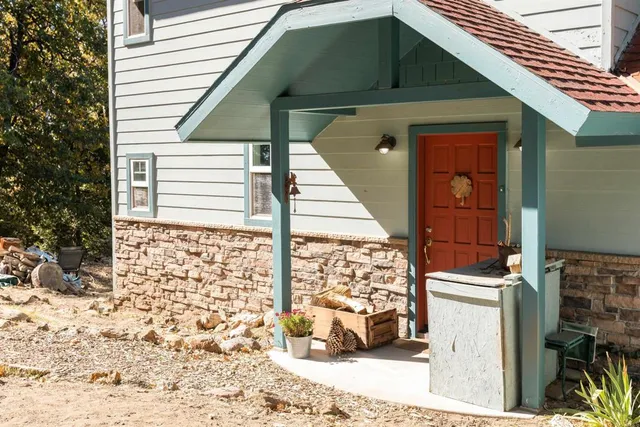 a view of living room with furniture and wooden floor