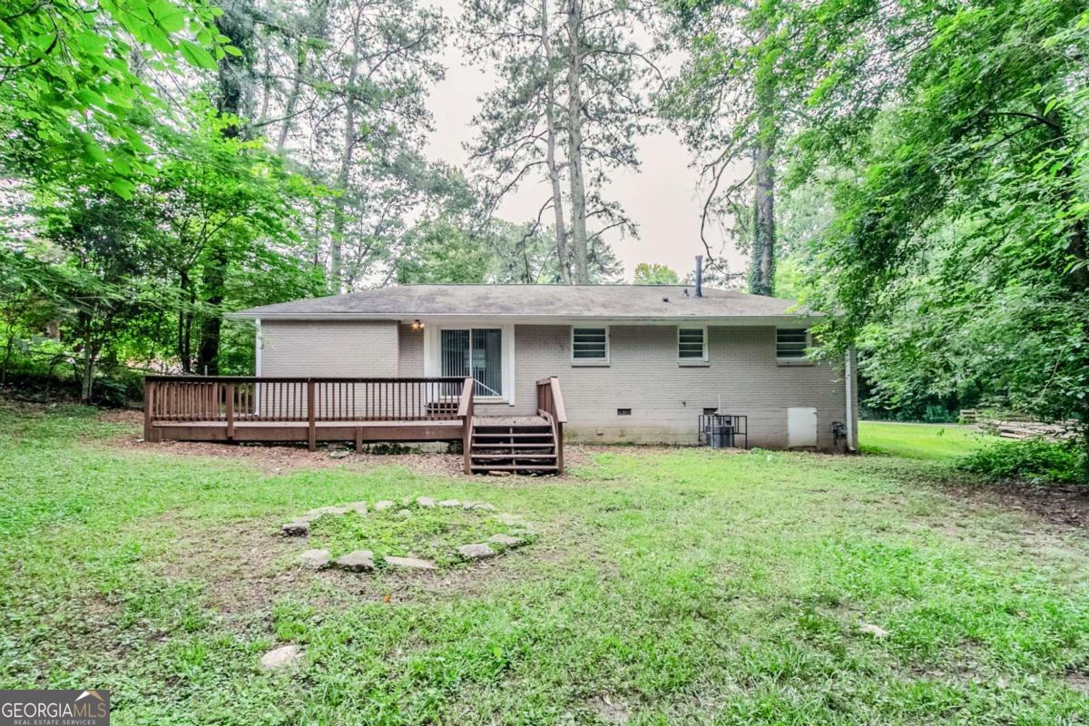 1715 Lee Street Decatur, GA 30035 - Photo 20 of 25 a view of a house with a yard and sitting area