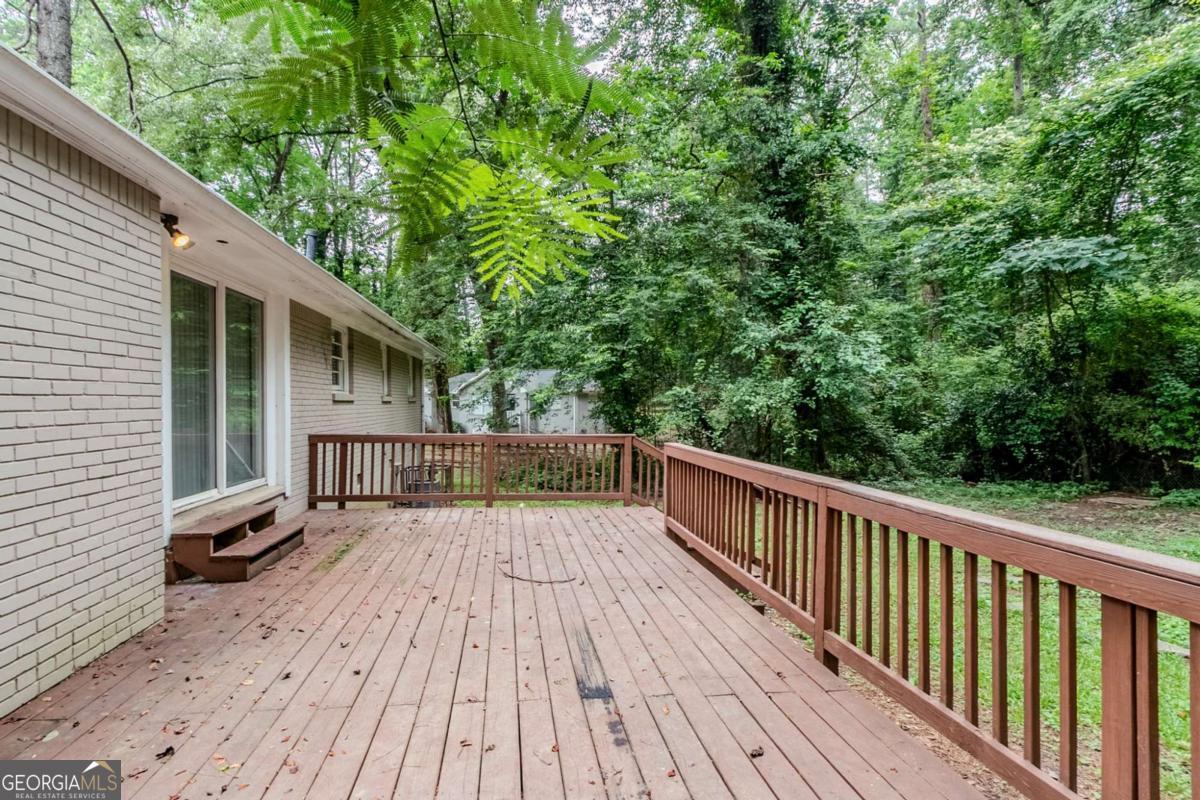 1715 Lee Street Decatur, GA 30035 - Photo 22 of 25 a view of balcony with wooden floor and fence