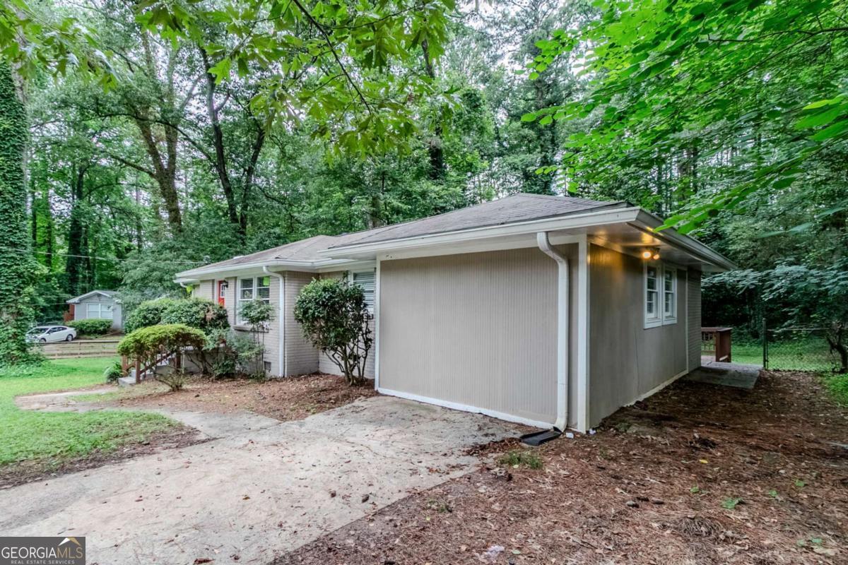 1715 Lee Street Decatur, GA 30035 - Photo 4 of 25 a view of a house with a yard
