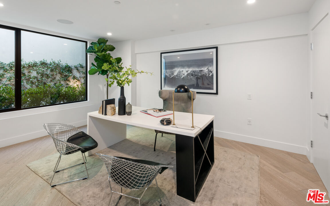 9455 Readcrest Drive Beverly Hills, CA 90210 - Photo 32 of 40 a view of a dining room with furniture window and wooden floor