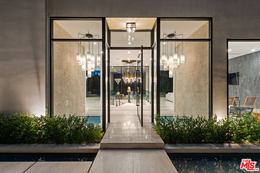 9455 Readcrest Drive Beverly Hills, CA 90210 - Photo 35 of 40 a front view of a house with a porch