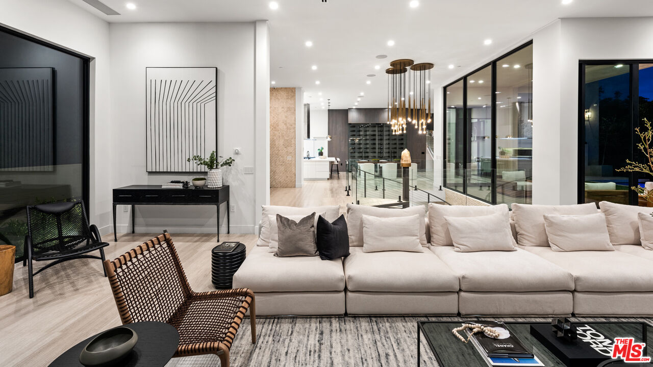9455 Readcrest Drive Beverly Hills, CA 90210 - Photo 37 of 40 a living room with furniture and a large window
