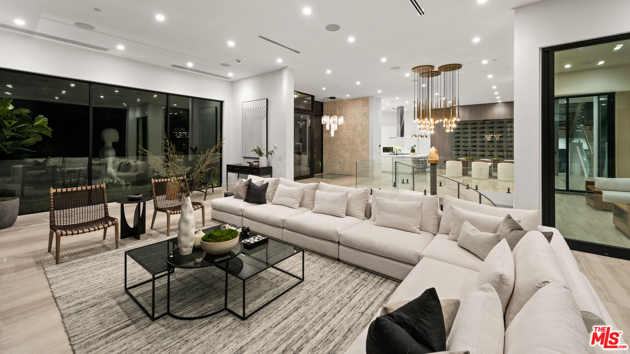 9455 Readcrest Drive Beverly Hills, CA 90210 - Photo 38 of 40 a living room with furniture and a large window