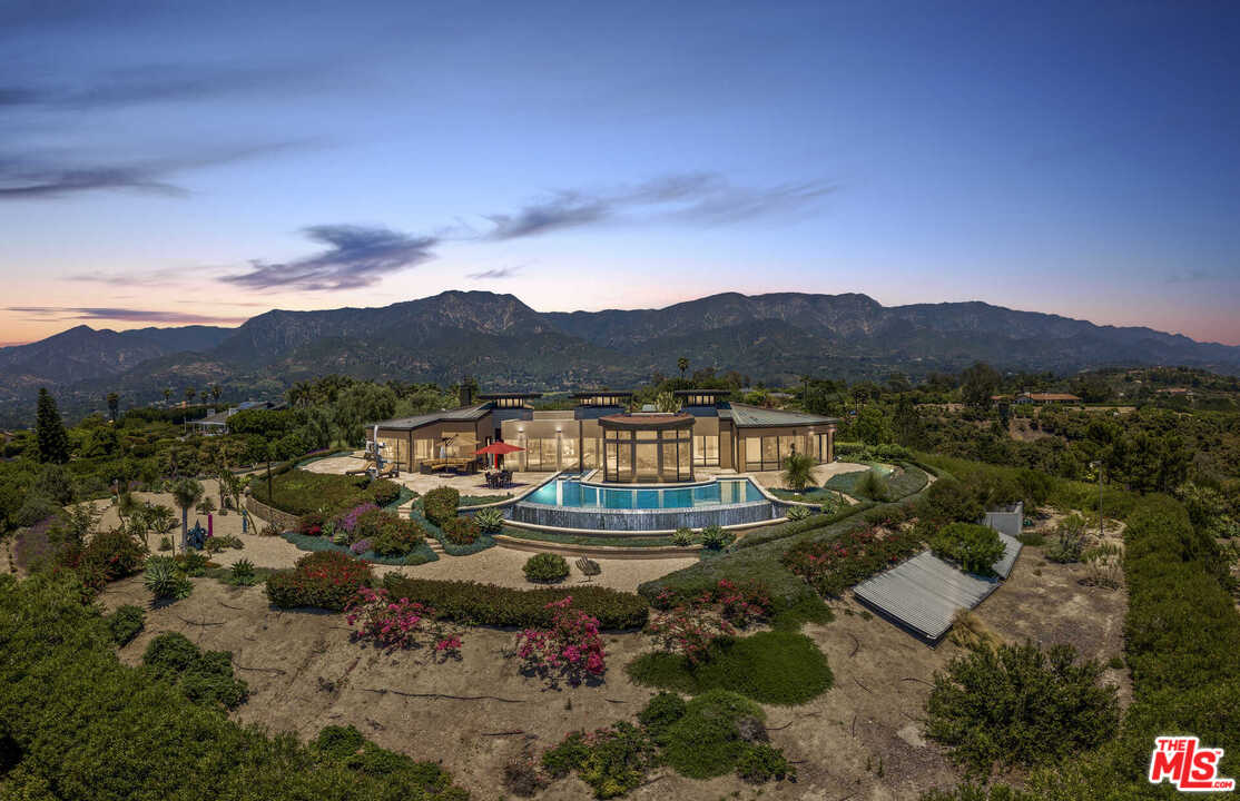 350 Ortega Ridge Road Montecito, CA 93108 - Photo 1 of 39 a view of a lake with mountains in the background