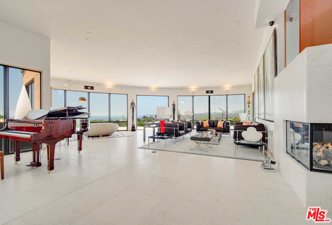 350 Ortega Ridge Road Montecito, CA 93108 - Photo 13 of 39 a view of a livingroom with furniture and a flat screen tv