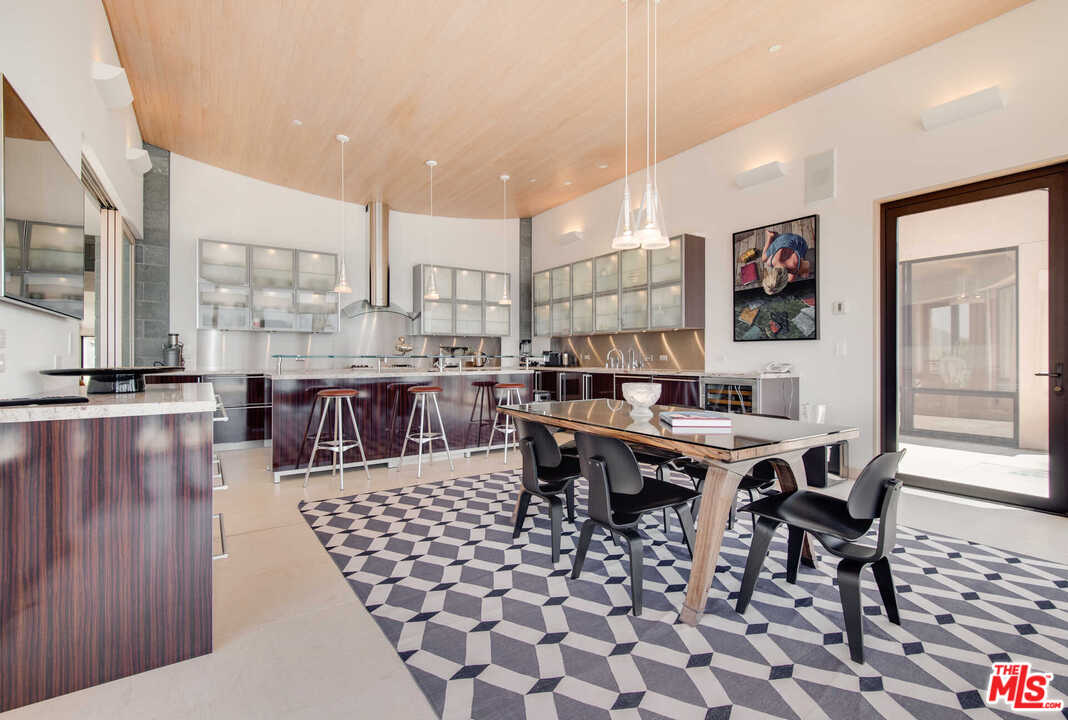 350 Ortega Ridge Road Montecito, CA 93108 - Photo 17 of 39 a view of a dining room with furniture