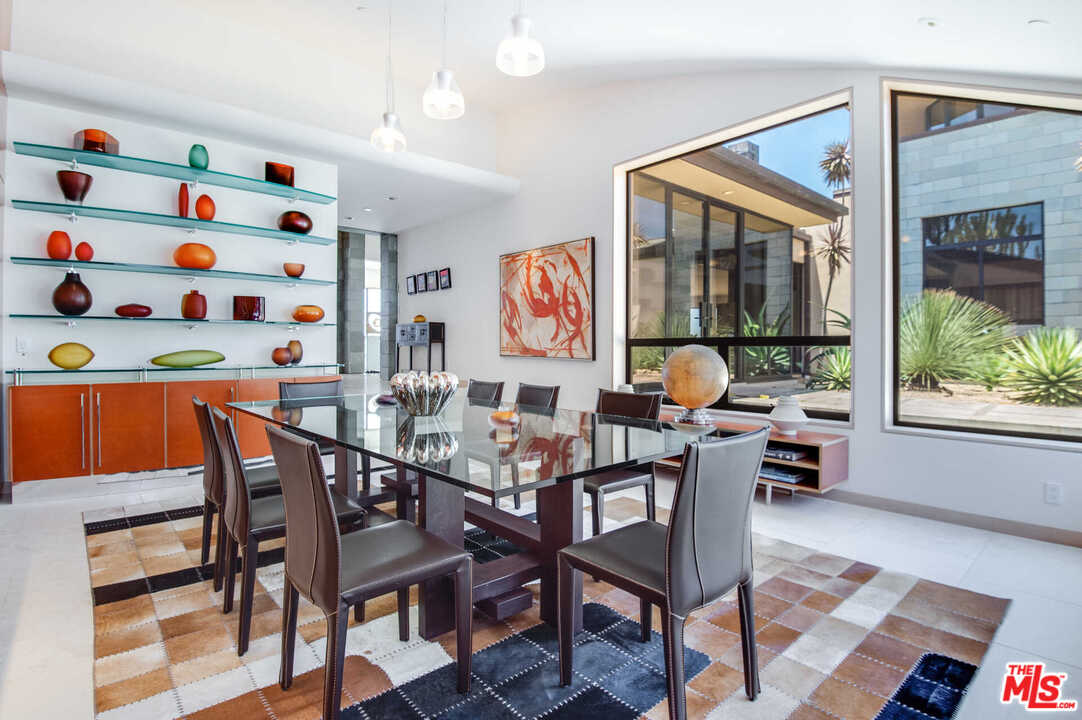 350 Ortega Ridge Road Montecito, CA 93108 - Photo 19 of 39 a dining room with furniture and window