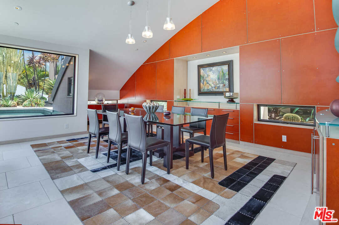 350 Ortega Ridge Road Montecito, CA 93108 - Photo 20 of 39 a dining room with furniture and a window