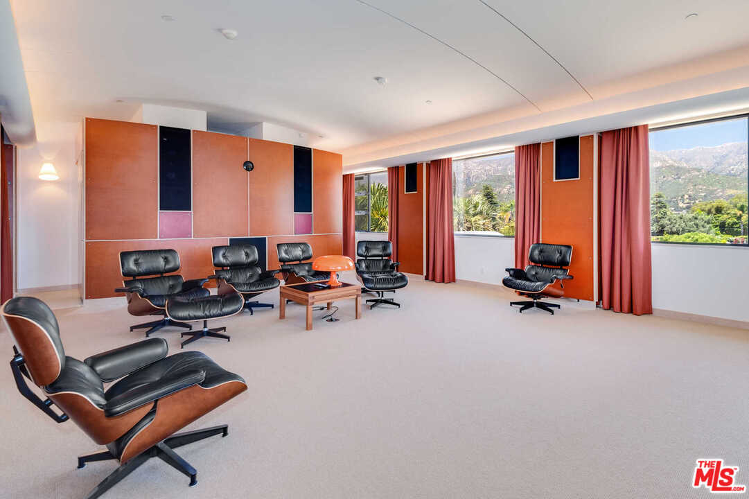 350 Ortega Ridge Road Montecito, CA 93108 - Photo 27 of 39 a living room with furniture and a large window