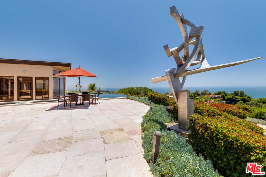 350 Ortega Ridge Road Montecito, CA 93108 - Photo 33 of 39 a swimming pool with outdoor seating and yard