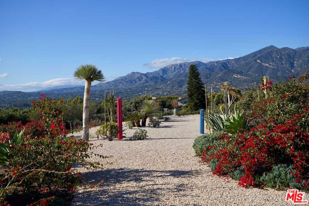 350 Ortega Ridge Road Montecito, CA 93108 - Photo 35 of 39 a view of a house with a yard and garden