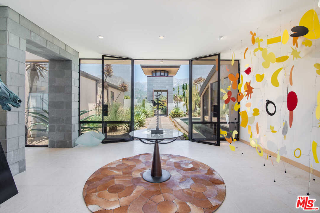350 Ortega Ridge Road Montecito, CA 93108 - Photo 10 of 39 a lobby with furniture and floor to ceiling window
