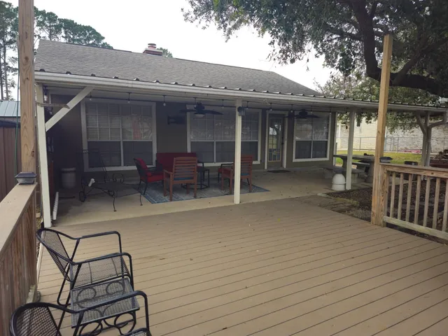 front view of a house with a patio